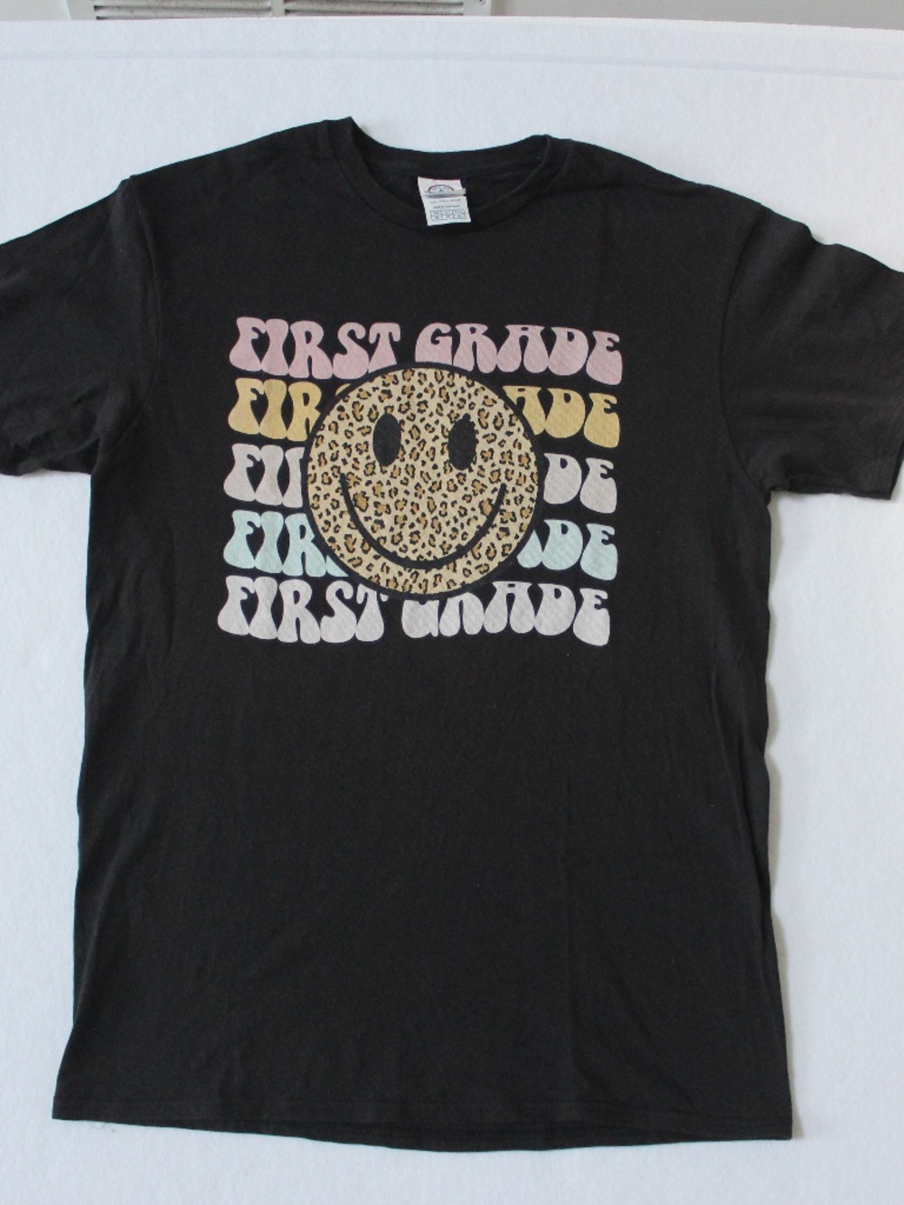 First Grade Teacher Smiley Face Leopard Print T-shirt Medium